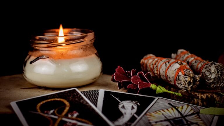 Tarot card cleansing using sage and candlelight
