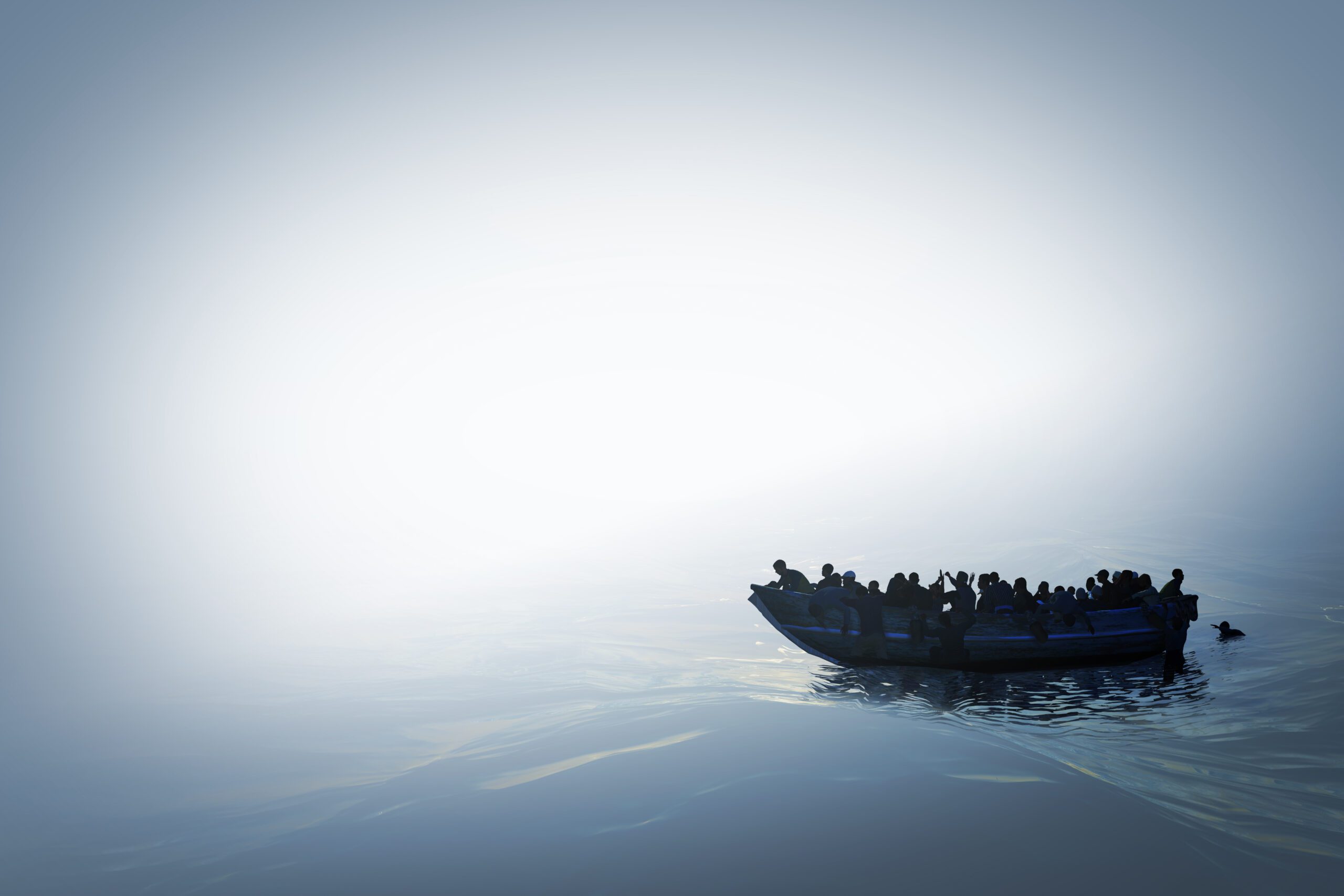 Immigrants on boat at sea
